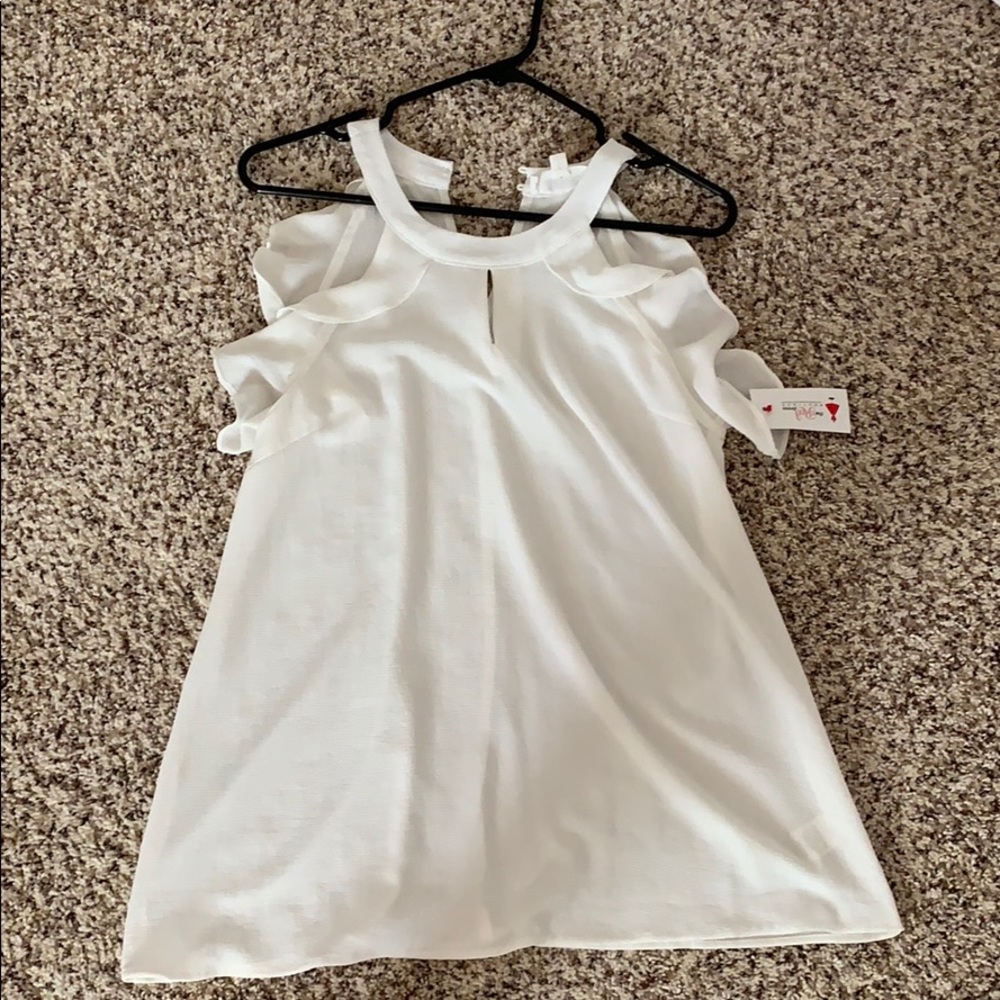 Sleeveless white top